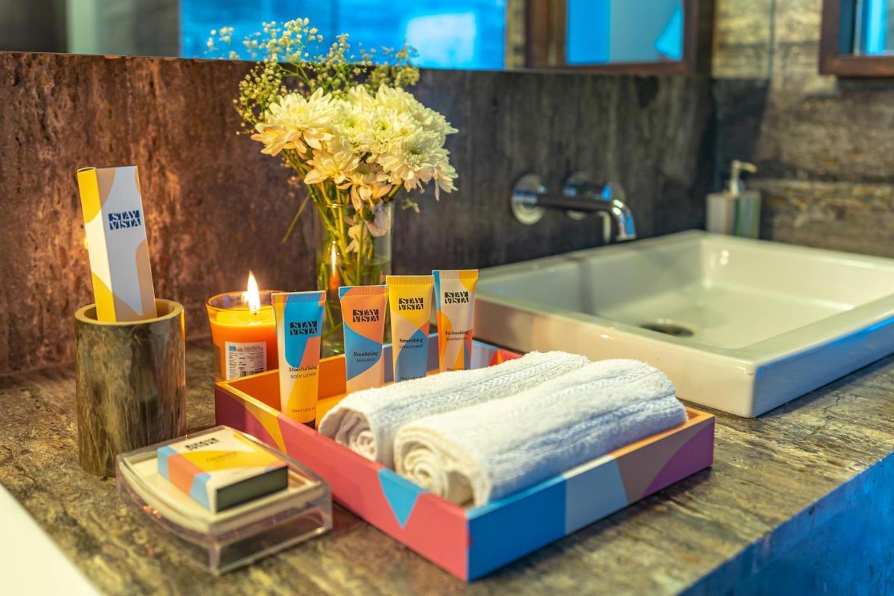 Oceanic Sunsets With River View, Comp Breakfast & Infinity Pool At Stayvista